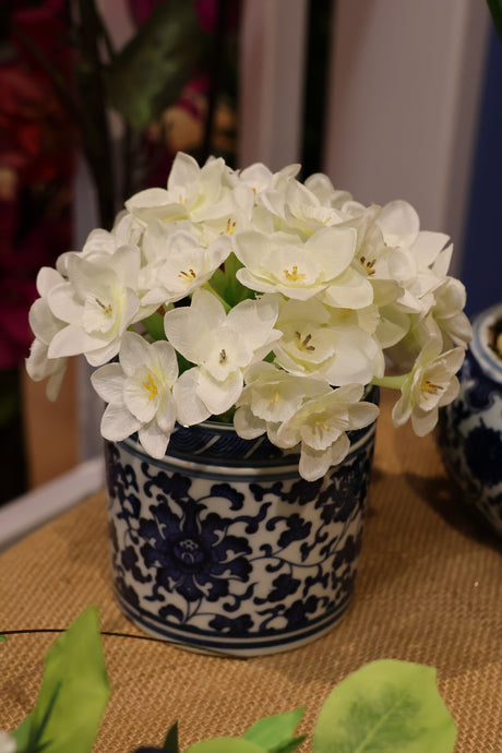 Daffodil Centerpiece In Ceramic Vase